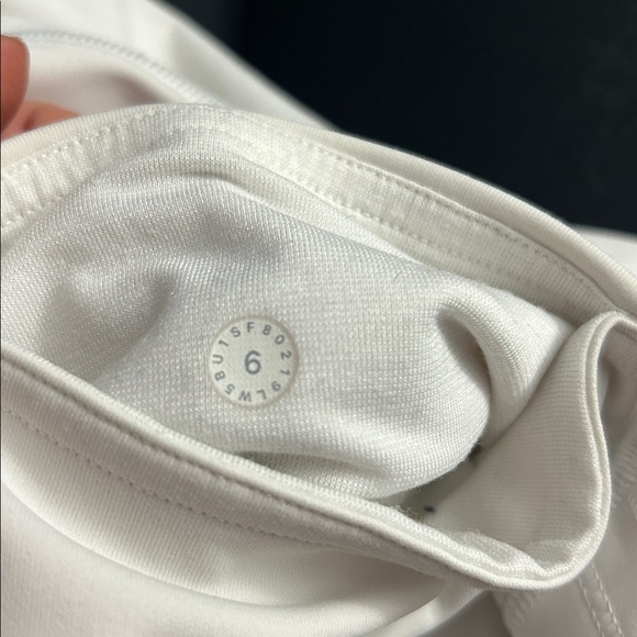 Lululemon white leggings with see through detail on lower legs. - Picture 8 of 8